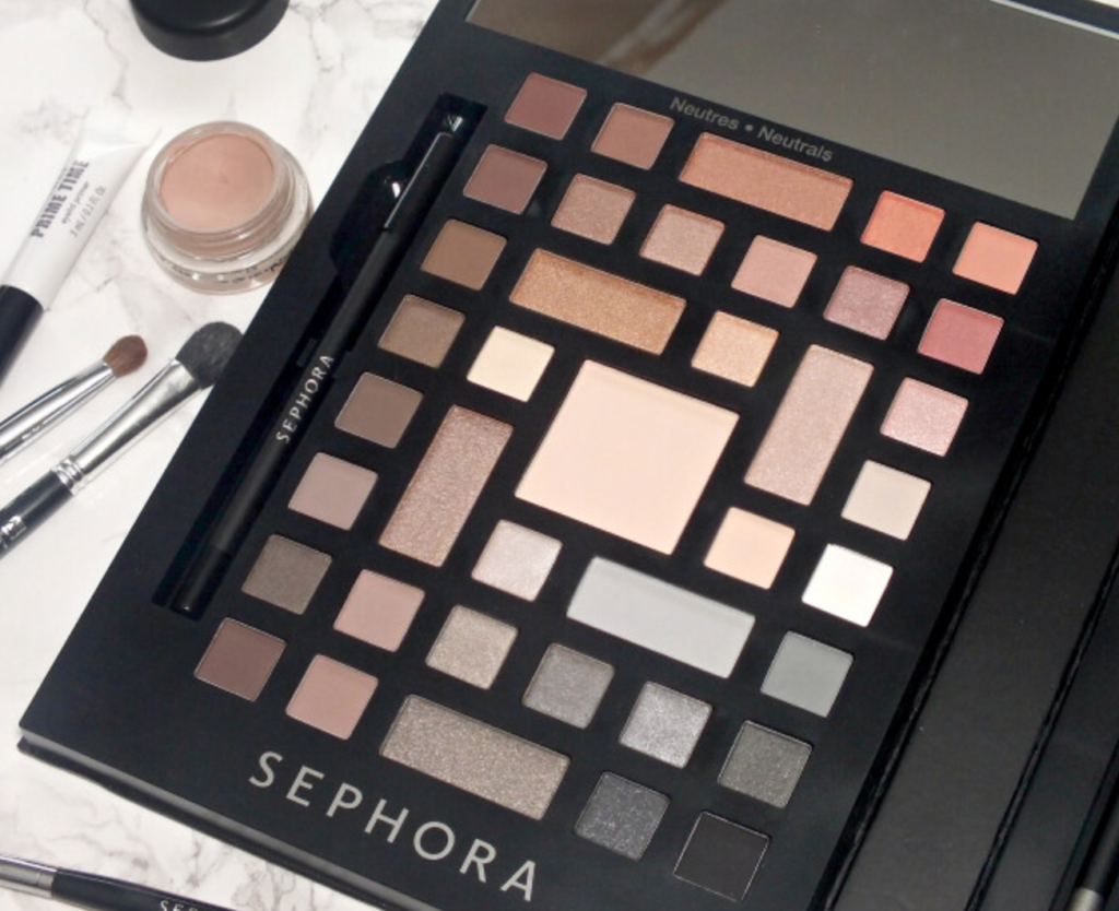 A Sephora brand makeup set. This is an eyeshadow palette featuring brown and grey neutral colors. 